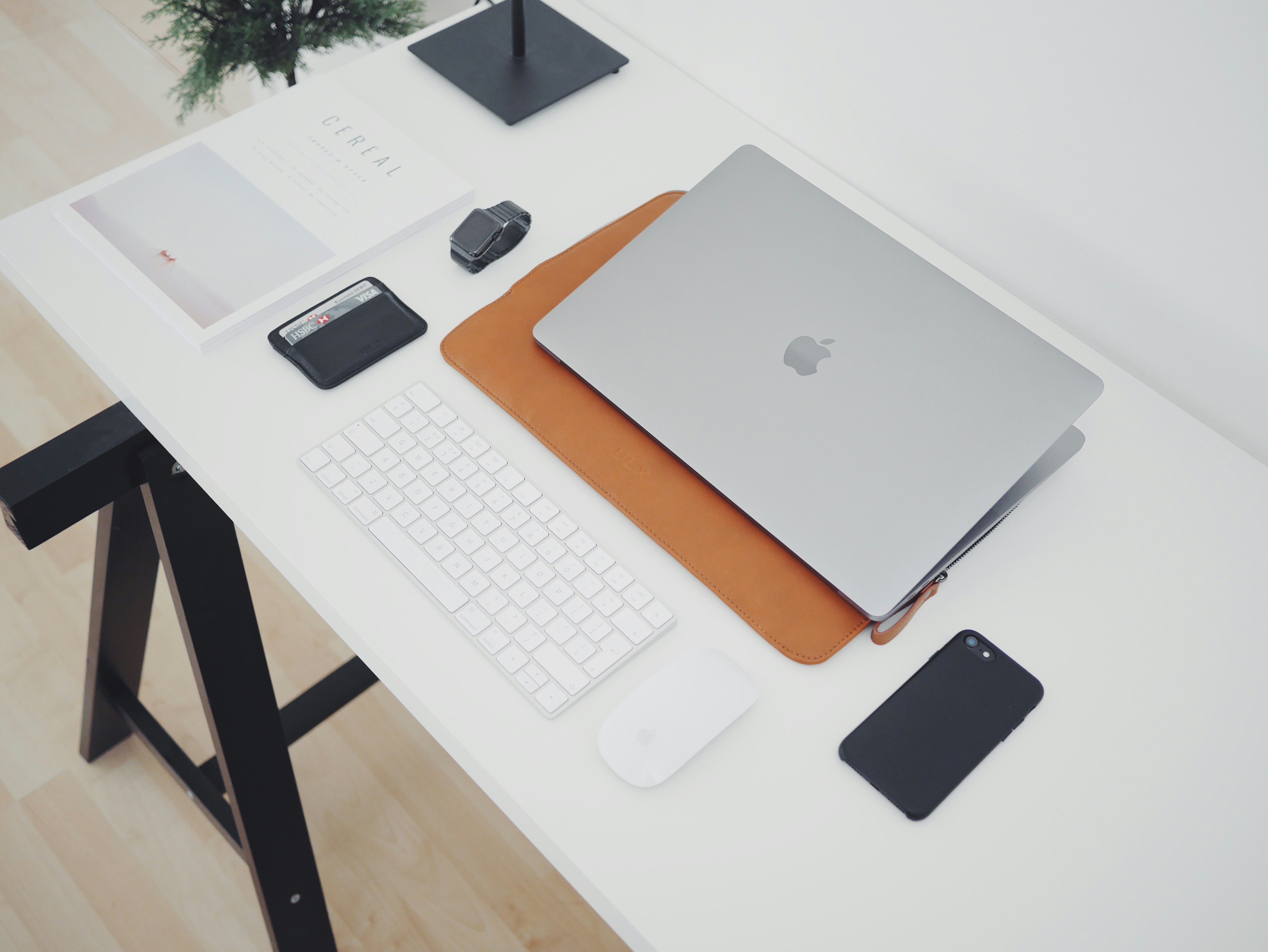 Minimalist desk setup with laptop and phone